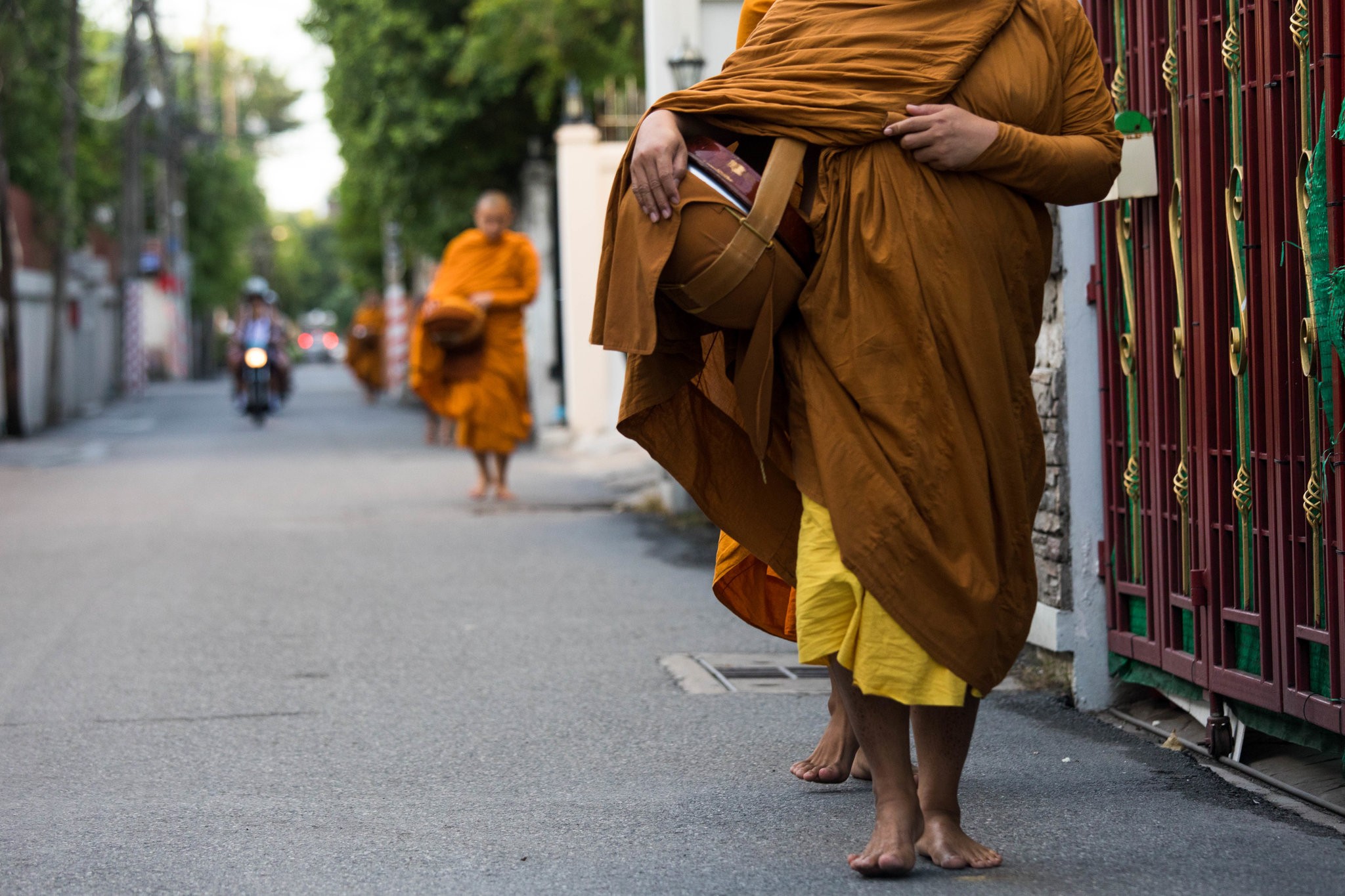 Buddhist monks collecting alms last month in Bangkok. Devotees’ abundant offerings of sugary or high-fat foods are contributing to a weight problem among monks.CreditCreditAmanda Mustard for The New York Times